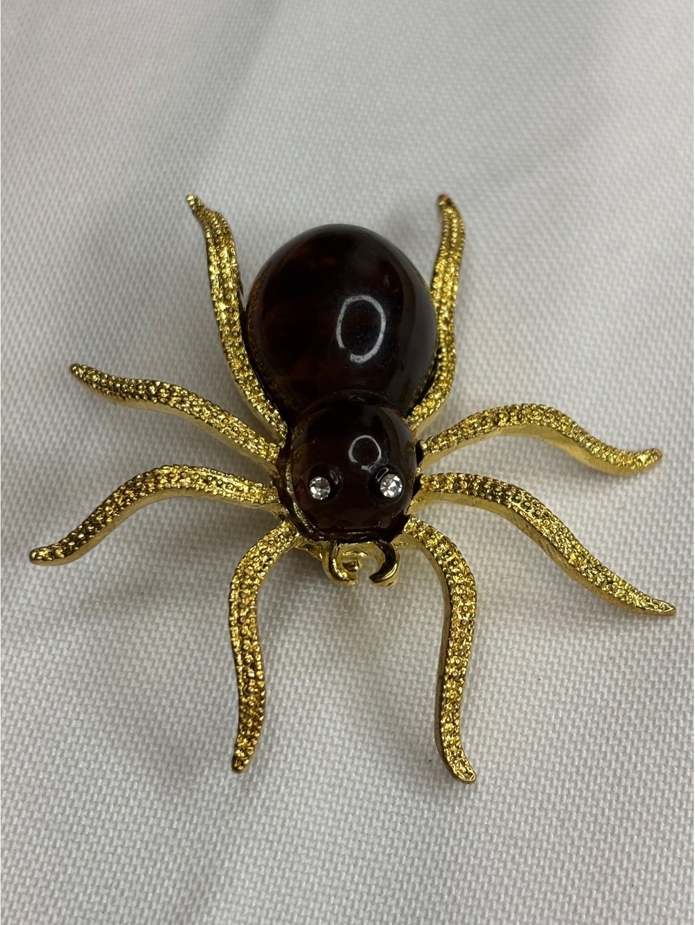 Vintage Lucite Spider Brooch with Gold Tone Legs and Rhinestone Eyes